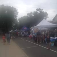 <p>Vendors fill the Main Street area Saturday for the Ridgefield Rewinds Summerfest. </p>