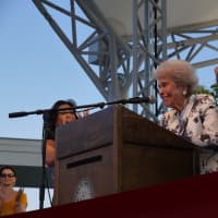 <p>Mimi Levitt acknowledges a standing ovation and congratulates Westport as she speaks of her fond memories of the town. </p>