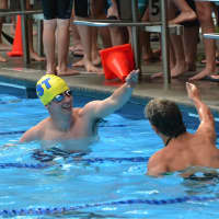 <p>Chappaqua Swim and Birchwood Swim team swimmers after a race on July 17.</p>