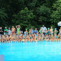 <p>Willowbrook Swim &amp; Dive and Birchwood Swim &amp; Tennis swimmers watch the diving competition.</p>
