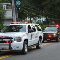<p>Putnam County Sheriff and New York State Police vehicles in the Brewster parade.</p>