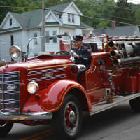 <p>A vintage Mahopac Falls firetruck in the Brewster parade.</p>