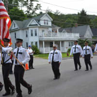 <p>Croton Falls firefighters march in the Brewster parade.</p>