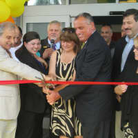 <p>The ribbon is cut at the Holiday Inn Express in Peekskill.</p>