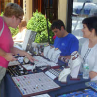 <p>Residents shop the sales at the annual Rye Sidewalk Sales. </p>