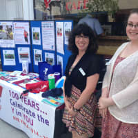 <p>Rye YMCA membership specialists tell people about the programs they have coming up in the fall. </p>