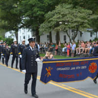 <p>Bedford firefighters march in their parade.</p>