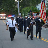 <p>Armonk firefighters march in the Bedford Fire Department&#x27;s parade.</p>