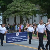 <p>Katonah Bedford Hills Volunteer Ambulance Corps members march in the Bedford parade.</p>