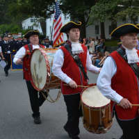 <p>Mount Kisco&#x27;s Ancient Fife &amp; Drum Corps marches in the Bedford Fire Department&#x27;s parade.</p>