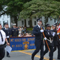 <p>Mount Kisco firefighters march in the Bedford Fire Department&#x27;s parade.</p>