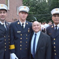 <p>Pictured are Bedford Supervisor Chris Burdick (second from right) with Bedford firefighters. They are 2nd Assistant Chief Shawn Carmody (left), Chief Peter Aquilino (second from left) and 1st Assistant Chief Pete Lazaro (right).</p>