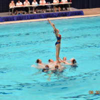 <p>Sychronized swimmers from the New Canaan YMCA Aquianas team perform at national swimming competition.</p>