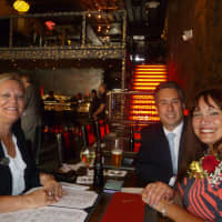 <p>From left, Denise Friend, Bob Shandly and Gina Perriello eat lunch at Red Plum. </p>
