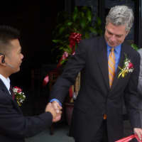 <p>Mayor Thomas Roach congratulated Peter Chen on the opening of his second Red Plum restaurant. </p>