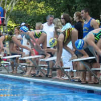 <p>Chappaqua and Willowbrook girls dive in for a race.</p>