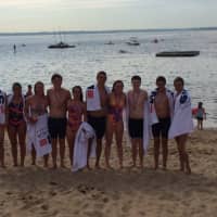 <p>Teen  swimmers dove into Long Island Sound to raise funding for cancer research and awareness at the Swim Across America-Long Island Sound Swim on July 26.</p>