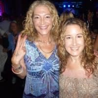 <p>Sharyn Friedman, left, of Armonk, meets up with her friend Ruby Engel of Larchmont, who rode the Furthur Bus. </p>