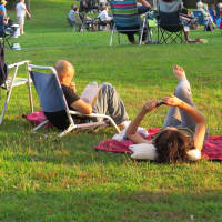 <p>Bill and Tina Johnson waiting for the concert to get started in New Rochelle.</p>