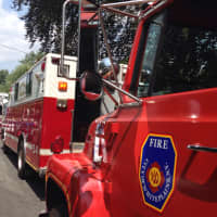 <p>Emergency crews respond to 15 Bradford Ave., Rye, where two workers were trapped after a trench collapsed Thursday.</p>