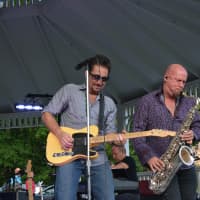 <p>Tramps Like Us plays to a large crowd in Chappaqua.</p>