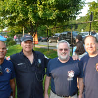 <p>The Chappaqua Fire Department had a table pose at the concert.</p>