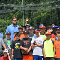 <p>Lucas Duda and kids pose for photos at Summer Trails Day Camp in Somers.</p>