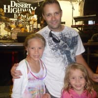<p>Sal Cambria, of Hastings, brings his daughters to the White Plains Dancing Under the Stars concert series. </p>