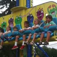 <p>Children enjoy the rides at the Easton Fireman&#x27;s Carnival.</p>