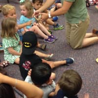 <p>The Nature of Things brought several animals for the students at Care Bear Camp to see and touch.</p>