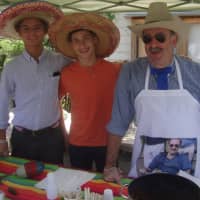 <p>Christopher McKinney, Brandon Rakowski and State Rep. Jonathan Steinberg offered a spicy chili at the Wakeman Town Farm Chili Cook-Off.</p>