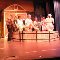 <p>The Wright Family kids of Hawthorne, left, watch the grape stomping scene in &quot;Most Happy Fella&quot; that will run at Westlake High School beginning aug. 8</p>
