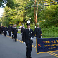 <p>South Salem firefighters march in their parade.</p>