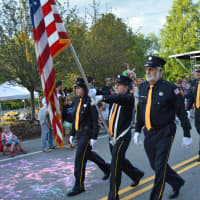 <p>Goldens Bridge firefighters march in the South Salem parade.</p>