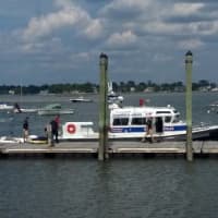 <p>Greenwich police officers keep an eye on a water tube involved in a fatal boating accident Wednesday.</p>