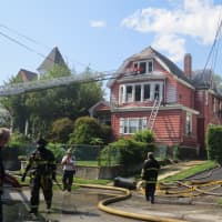 <p>Firefighters continue battling the blaze in Mount Vernon.</p>