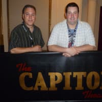 <p>Marshall Toppo (left) and Brian McClintock take a tour of The Capitol Theatre. </p>