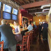 <p>There are nearly a dozen televisions broadcasting sports at the New Rochelle sports bar.</p>