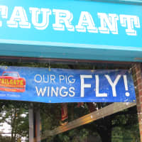 <p>The new New Rochelle eatery is proud of its pig wings.</p>
