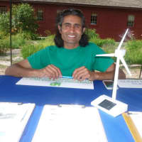 <p>Not everything is about food at the Wilton Farmers Market as Janak Desai of Fairfield promotes the state&#x27;s clean energy options program. </p>