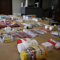 <p>Fairfield police seized a large amount of steroids, human growth hormone, drug paraphernalia, capsule presses, cash and firearms from the homes of two suspected leaders of the distribution ring in Fairfield County.</p>