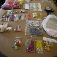 <p>Fairfield police seized a large amount of steroids, human growth hormone, drug paraphernalia, capsule presses, cash and firearms from the homes of two suspected leaders of a distribution ring in Fairfield County.</p>