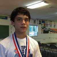 <p>Liam Smith of Wilton wins the gold medal in the Nutmeg State Games in the Fencing Cadet category. </p>