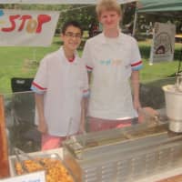 <p>Edouard De Parcevaux and Charlie Stout of Non-Stop Donut Shop make their mini-donuts right in front of the customers at the Rowayton Farmers Market.</p>