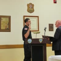<p>Elmsford Police Officer Paul Resigno is sworn in on Aug. 6.</p>