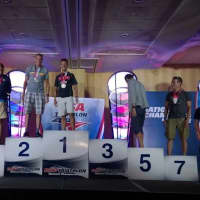 <p>Easton&#x27;s Chris Thomas stands atop the podium after winning the Masters Division at the USA Triathlon Age Group National Championships Saturday in Milwaukee.</p>