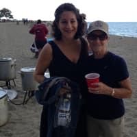 <p>Two women meet up at the clambake.</p>