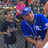 <p>Craig Carton poses for a picture with a fan before the third annual WFAN Celebrity All-Star Game in New Rochelle.  </p>