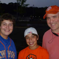 <p>From left, Evan, Joshua and Ken Greenberg at the Celebrity All-Star Softball Game in New Rochelle at Flower Park Wednesday. </p>