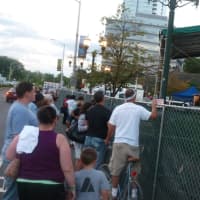 <p>For those who didn&#x27;t want to pay to hear the Beach Boys at Alive@Five, there is always behind the fence on Washington Boulevard.</p>